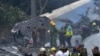 Personal de emergencia trabaja en el área del accidente aéreo ocurrido el 18 de mayo de 2018 en La Habana, Cuba. Archivo, AFP.